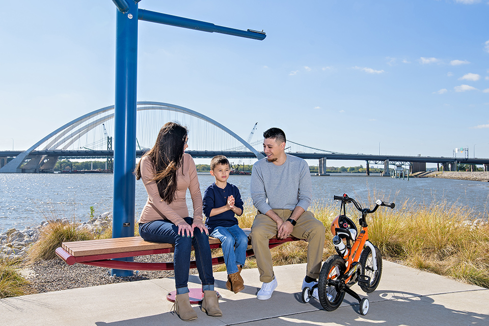 family on riverfront